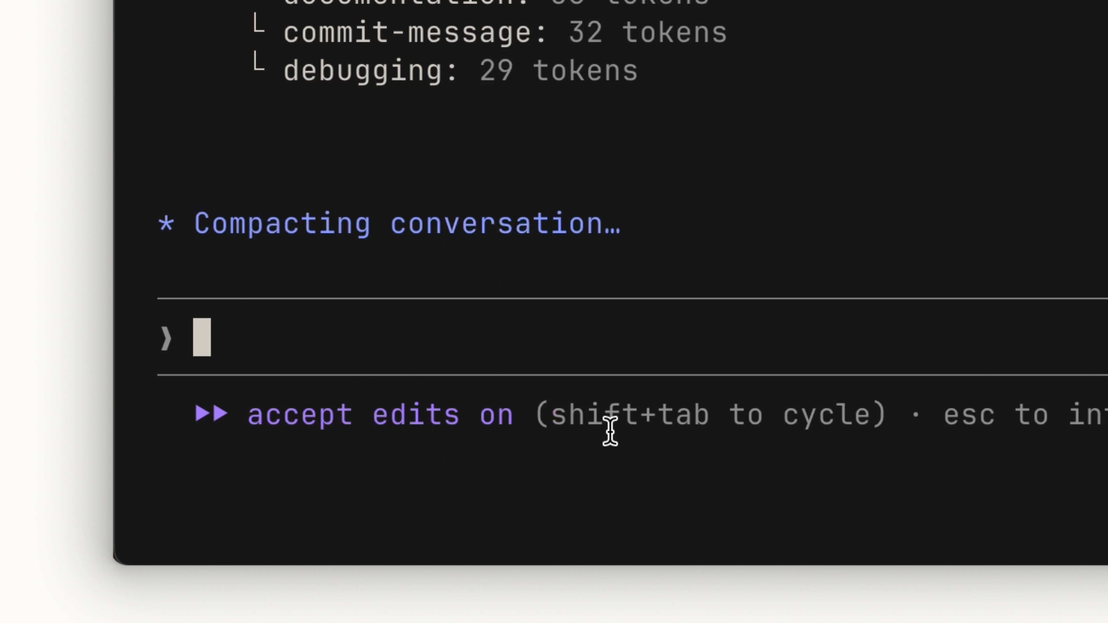 Claude Code showing 'Compacting conversation...' as it summarizes the context