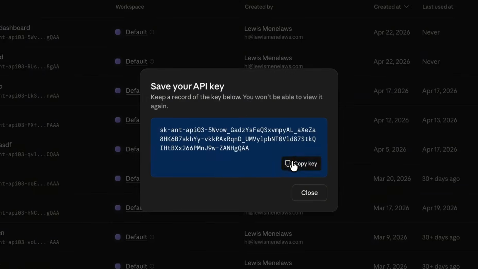 The Claude Console dialog showing a newly created API key with a Copy key button and a warning that the key won't be viewable again
